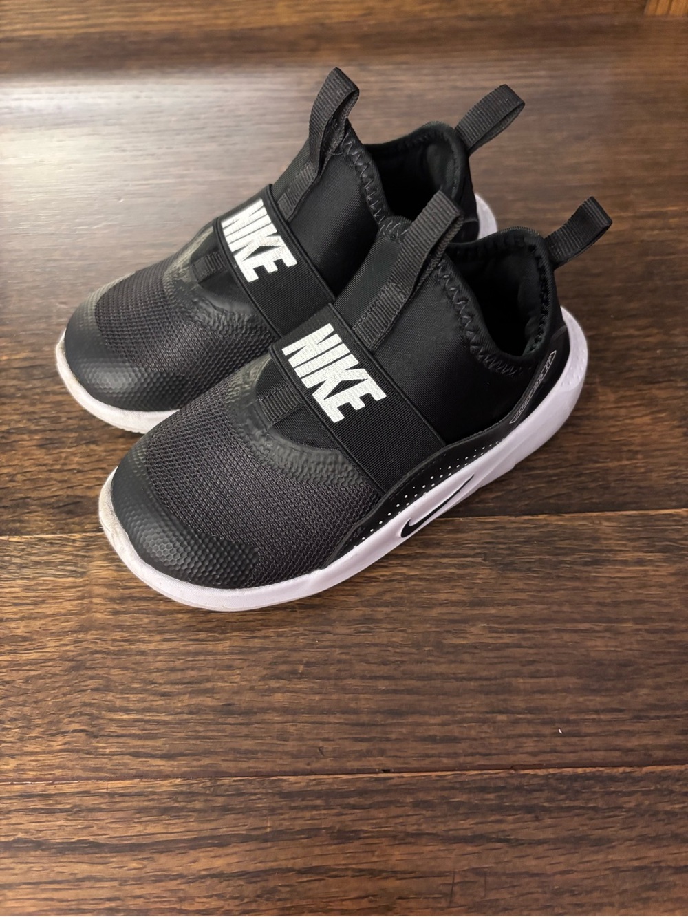 Nike Kids Black and White Slip-On Sneakers